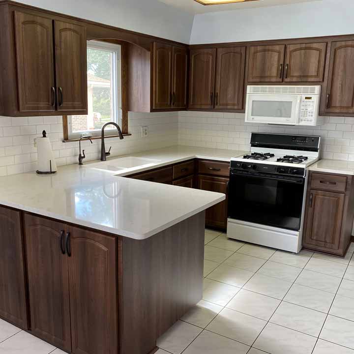 After - Dark Brown wood kitchen cabinets