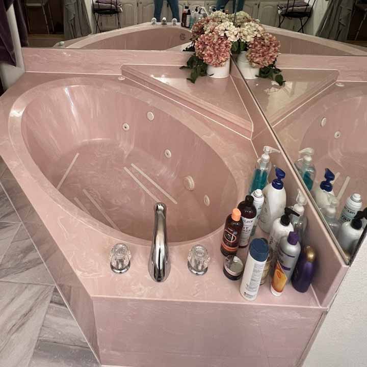 Before - pink bathtub