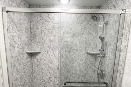 White wall shower with sky window